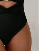 Maiô Monokíni Sexy com Decote Halter e Detalhe Vazado em Metal Maiô Monokíni Sexy com Decote Halter e Detalhe Vazado em Metal Maritima Moda Praia 